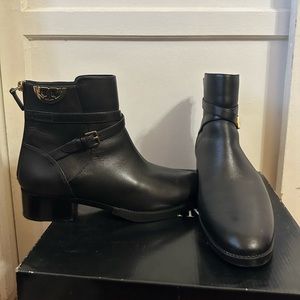 Tory Burch black leather round-toe Moro boots with gold deco